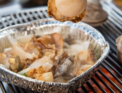 A grilled clam filled with the vibe of Busan’s sea
